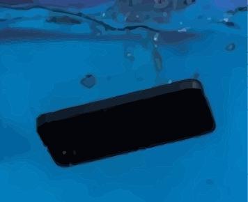 iPhone 12 Pro ouvert avec carte mère en cours de dépose